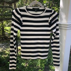 Striped sweater with shoulder ruffles